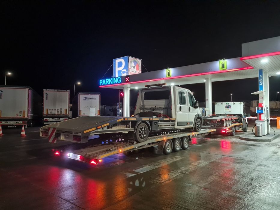 Tractari Transport Auto Autoutilitare Utilaje Marfa Intern si International Non Stop 24/7