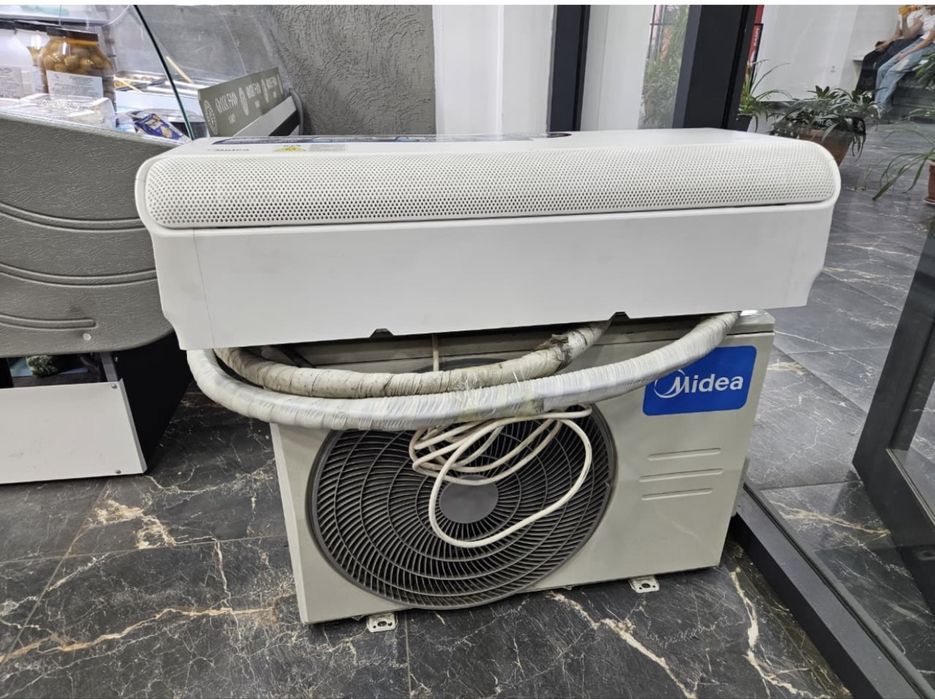 Кондицирнер Midea