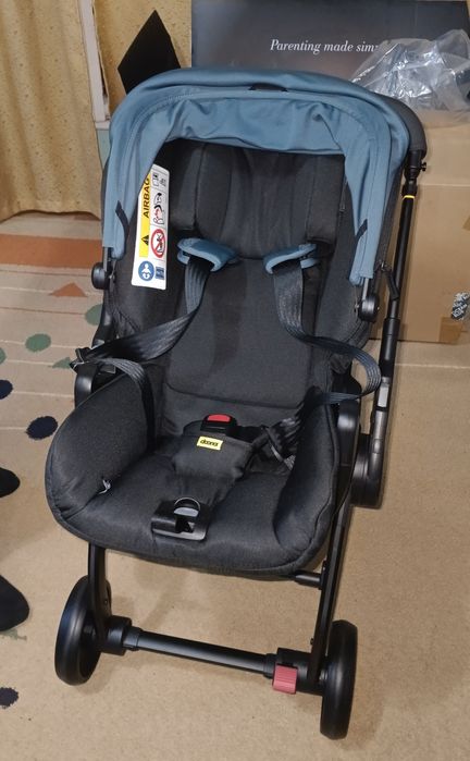 Новая коляска doona