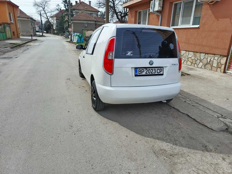 Шкода Практик 1.2