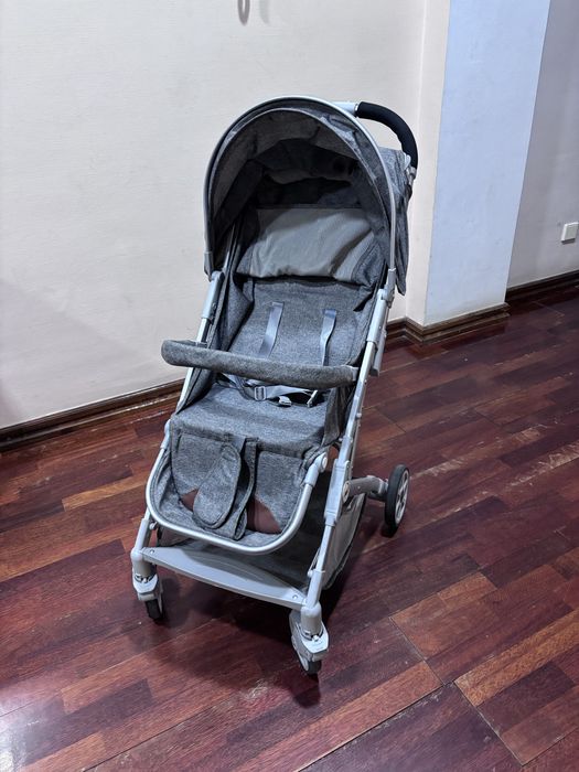 Прогулочная детская коляска