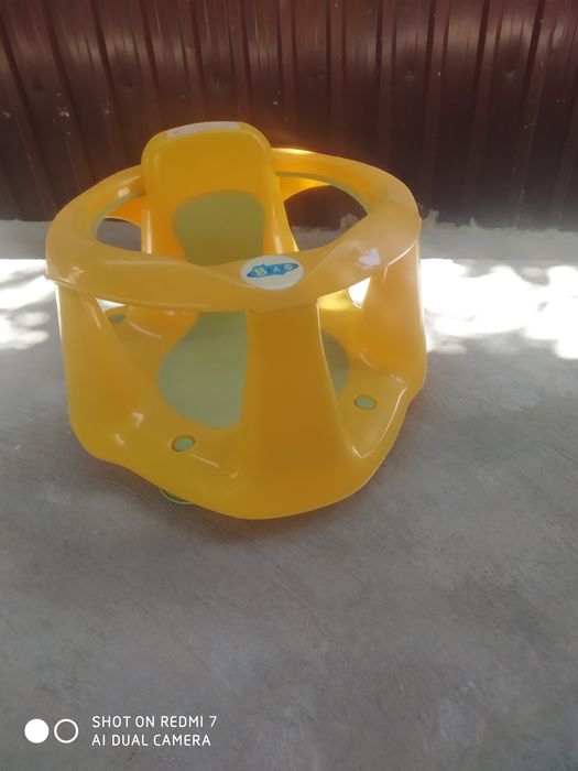 Сиденье на присосках для ванны