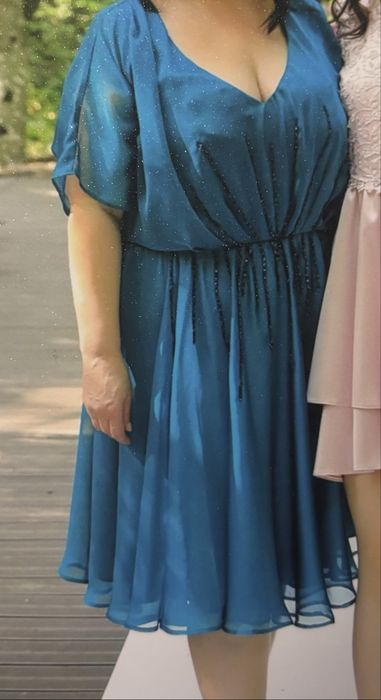 Rochie din mătase verde smarald cu aplicații prețioase