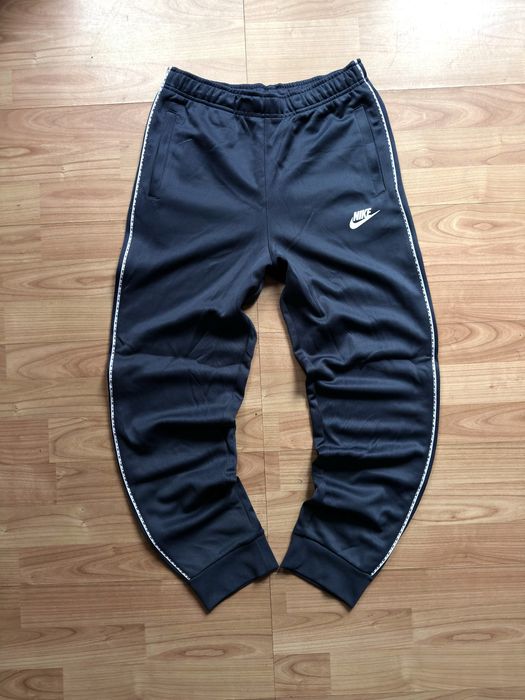 Pantaloni training pants joggers tapered leg Nike blue poliester