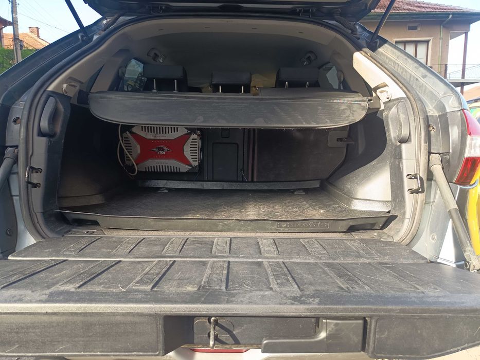 Renault Koleos 2009 2.0 dci 4X4 150 кс