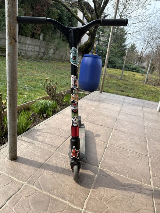 Vand trotineta freestyle negru/rosu in stare buna
