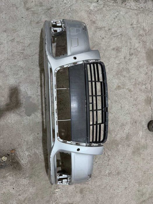 Bara fata AUDI A6 C6 facelift 2010 cu gauri pentru senzori de parcare culaore gri LX7W