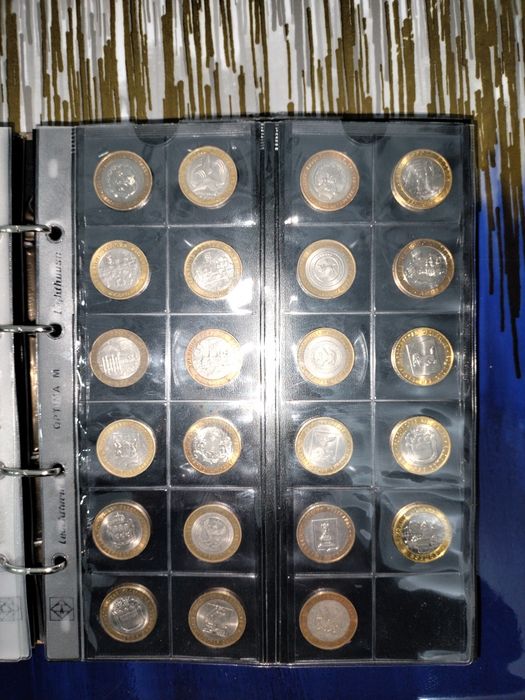 Продам альбом с монетами