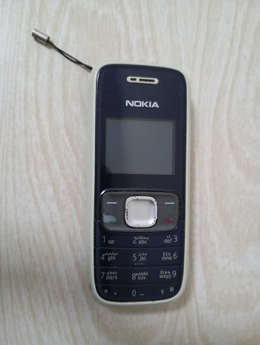 Продам б/у телефон Nokia 1209 (RH-105)