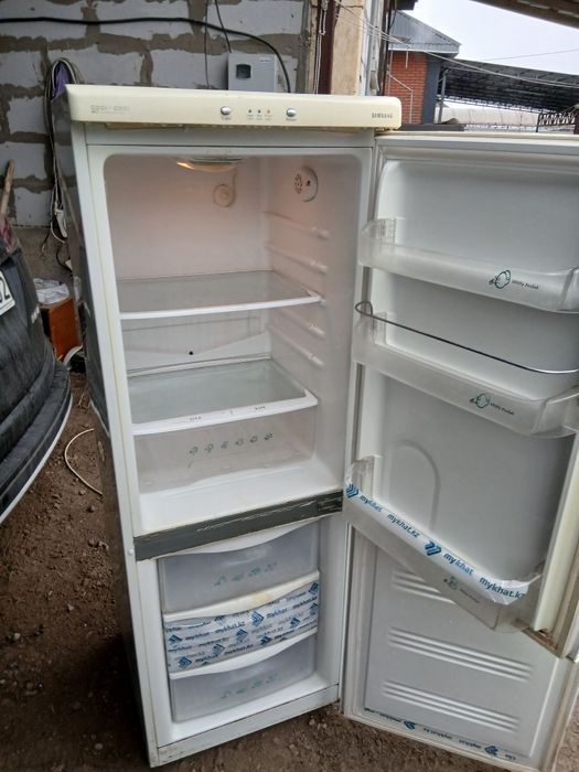 С доставкой холодильник рабочий.