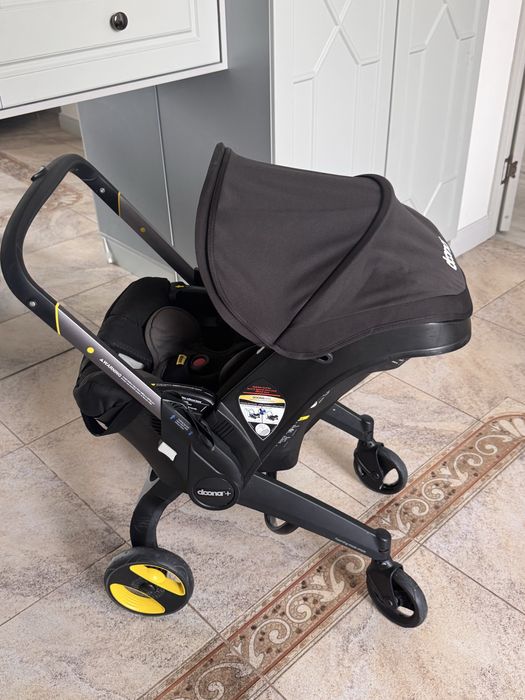 Коляска- автокресло Doona