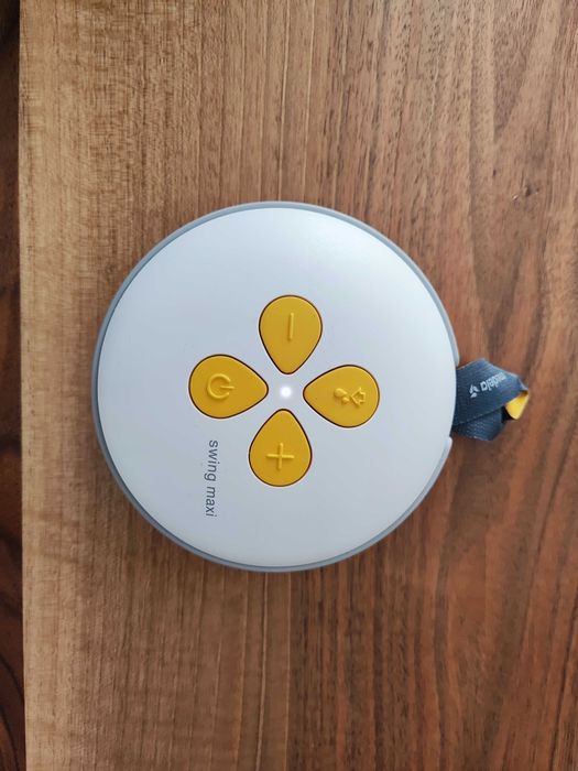 Двойна хендсфри помпа за кърма Medela Swing Maxi Hands-Free