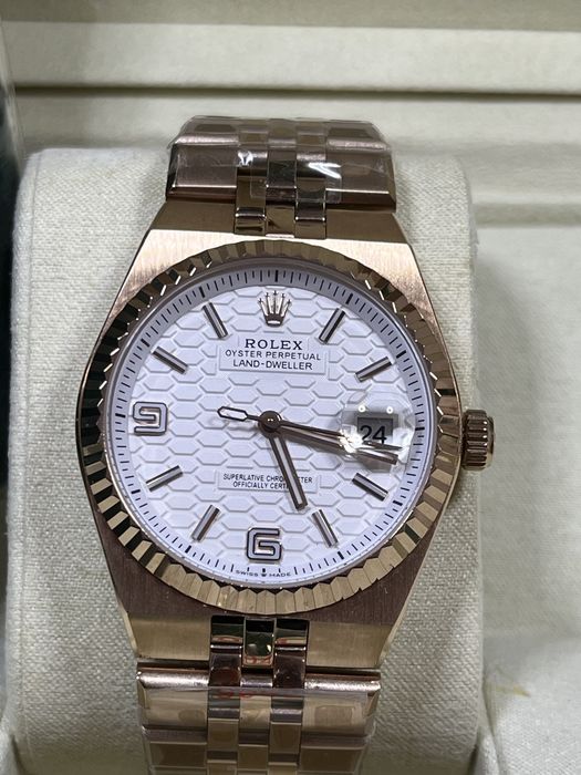 Rolex Land Dweller Roz gold de dama