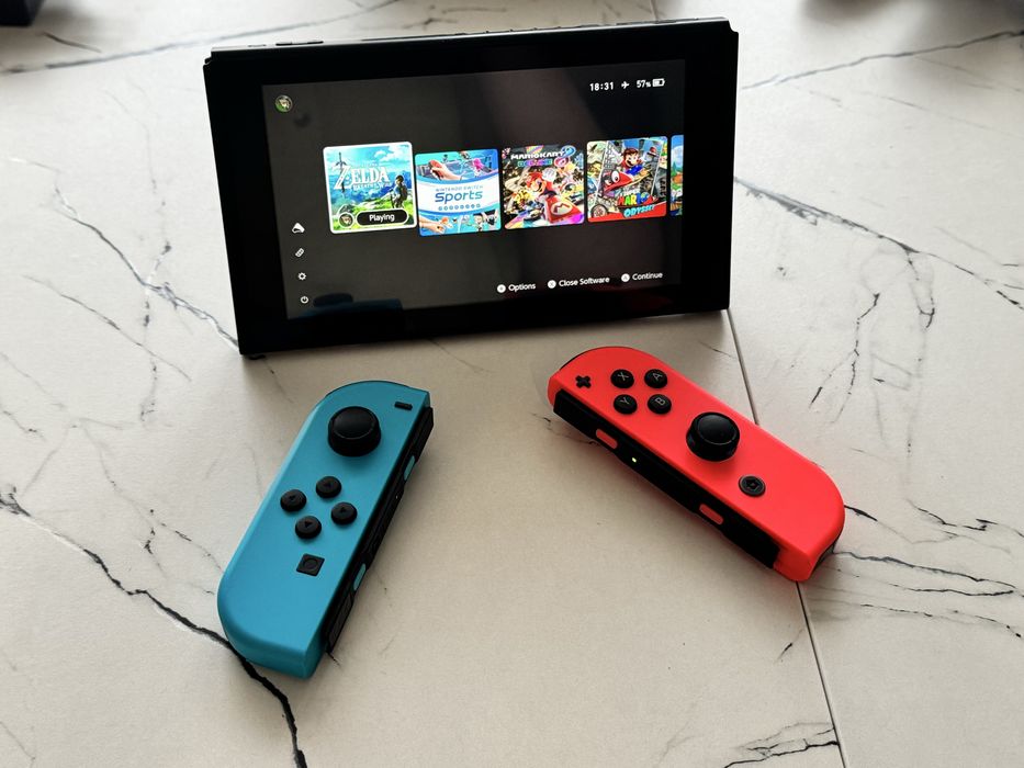 Nintendo Switch V2 Modat ca nou + card 128 gb