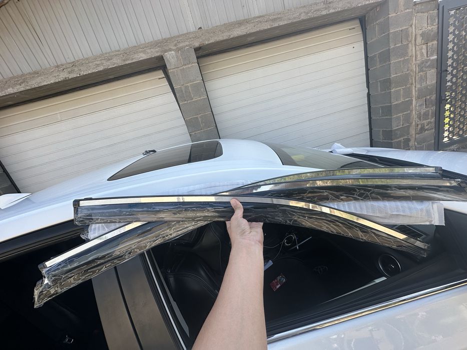 Corolla окно дождь щит