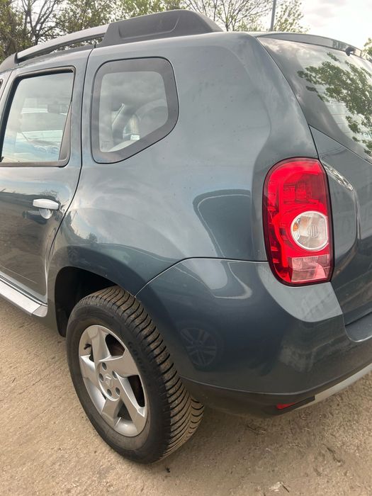 Aripă dreapta spate Dacia Duster