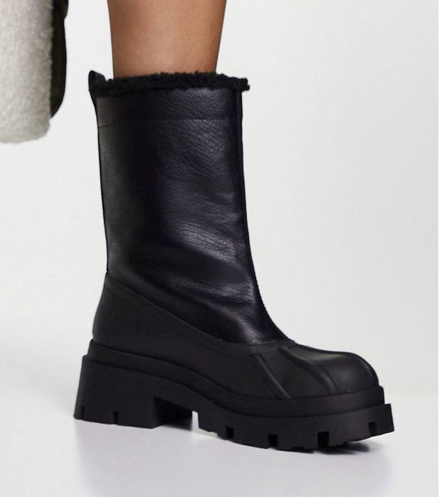 Продам сапоги новые