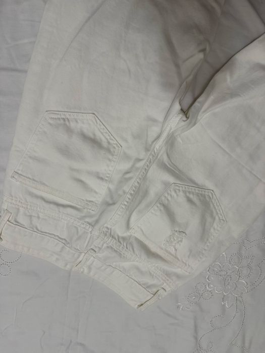 рванные белый брюки