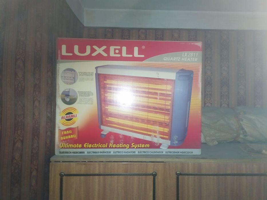 Масляный обогреватель