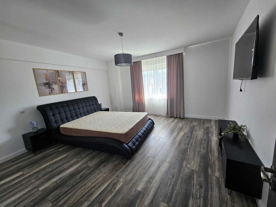 PF dau in chirie apartament 2 camere + living generos Ultra Central Zalau - loc parcare subteran + lift, suprafata utila 110mp
