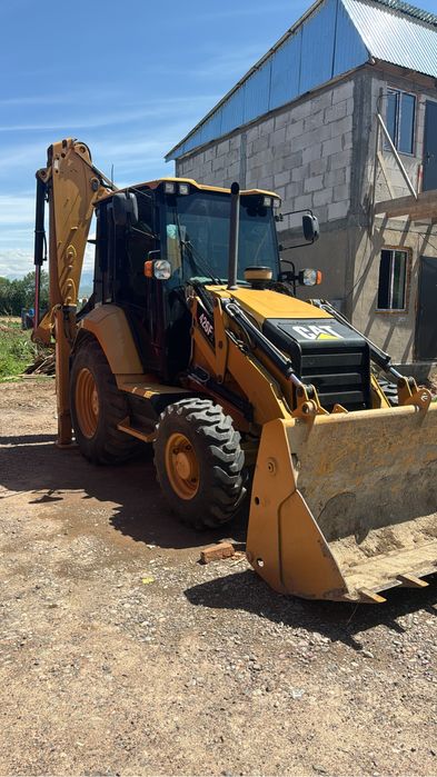 Экскаватор Пагрузчик CATh