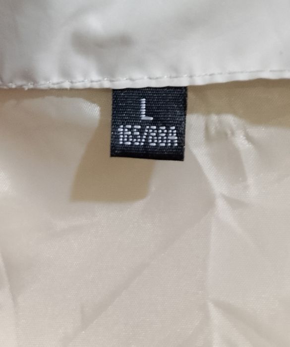 Продам  зимний пуховик б/у