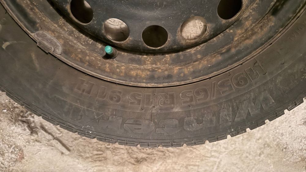 4 roți complete Opel Astra G – jante tablă + anvelope iarnă 195/65 R15 M+S