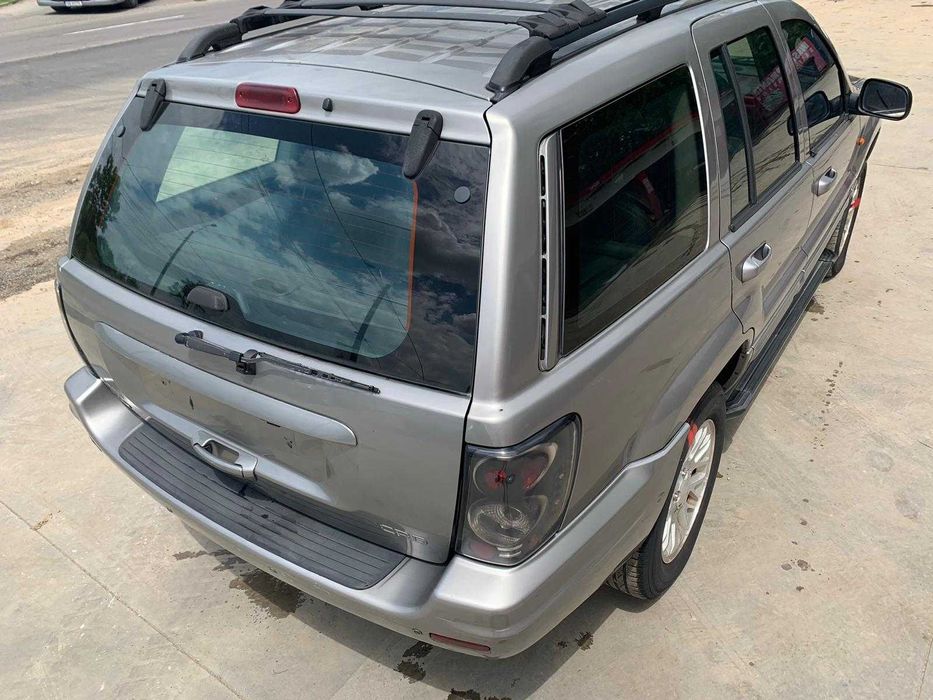 Dezmembrez Jeep grand cherokee 2.7 crd/jeep 3.1/bara fata completa/