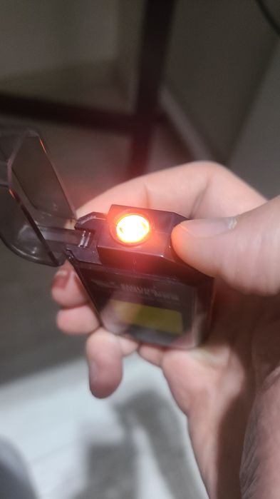 Электронная зажигалка с фонариком