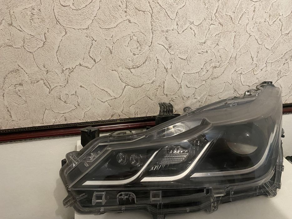 Фара на каролу 210 кузов