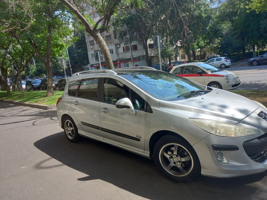 Vindem Peugeot 308 sw Panoramic dublu climatronic 300 mii kilometri