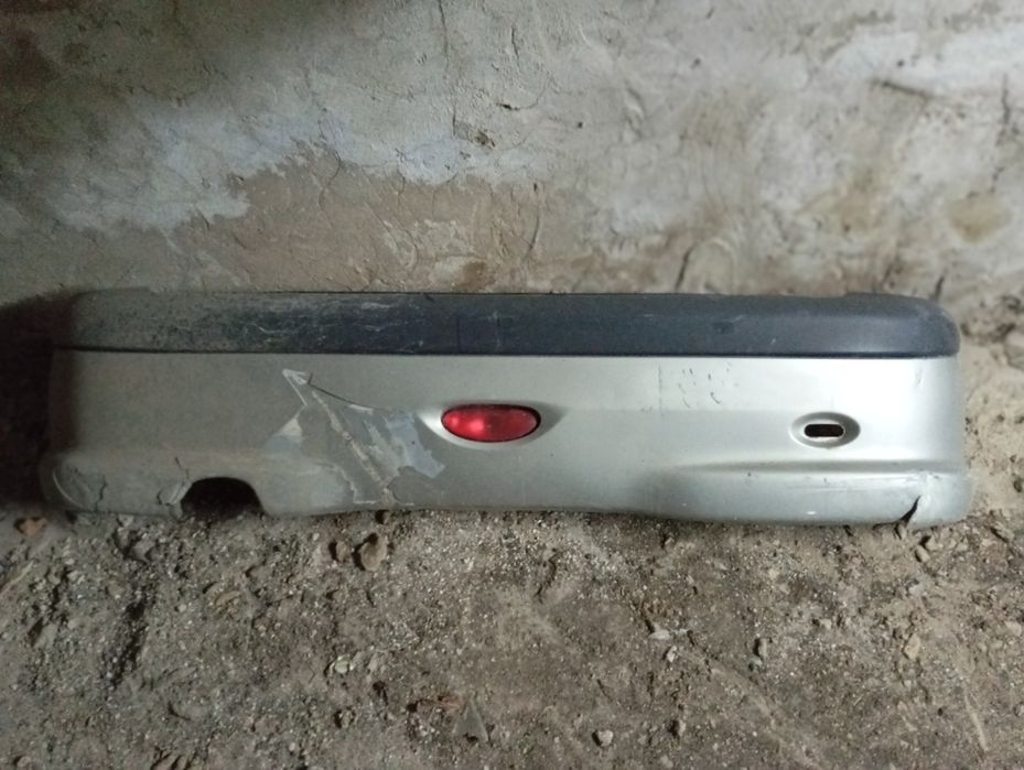 Бампер задний пежо 206