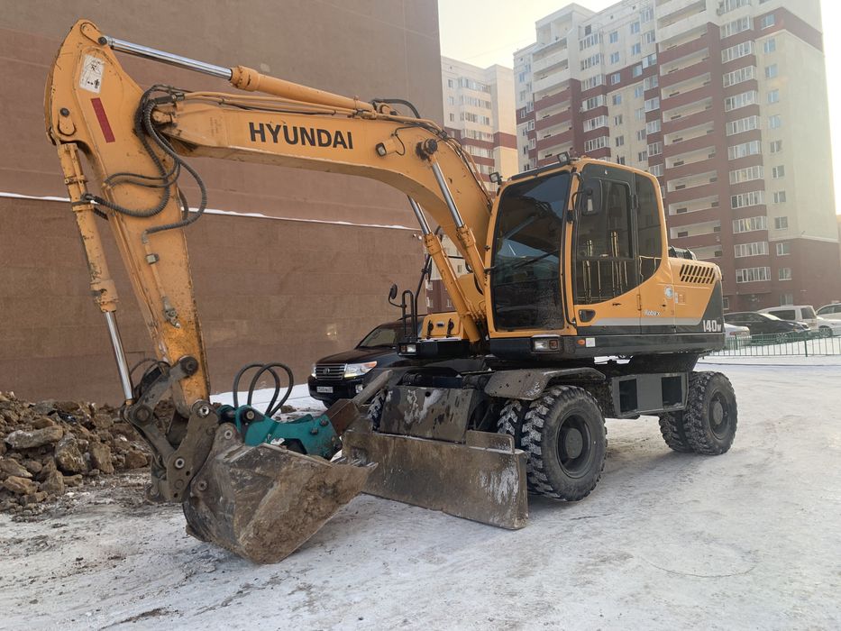 Аренда колесного экскаватора