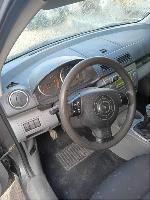 Mazda 2 - на части