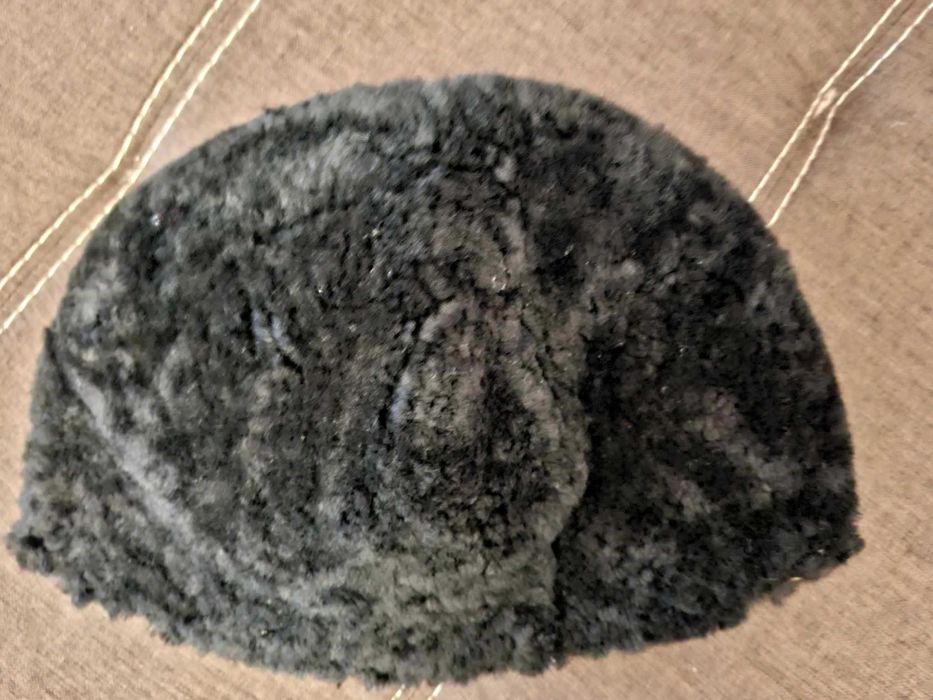 Части от народна носия.Престилка и калпак.