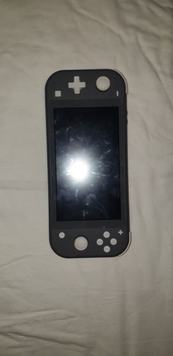 Nintendo switch lite, cu card sd 32gb si 2 jocuri