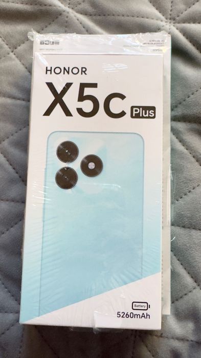 От оператор смартфон и външна батерия Honor X5c Plus