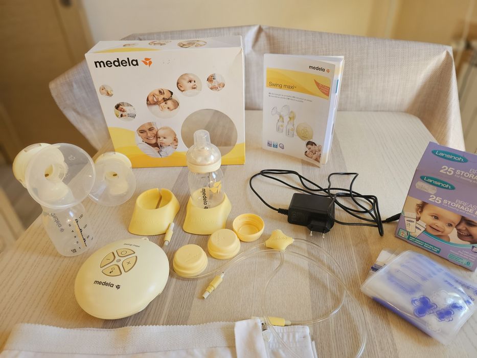 Двойна помпа за кърма Medela Swing Maxi + биберон Calma + подарък