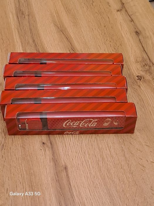 Коледни камиончета на Coca-Cola