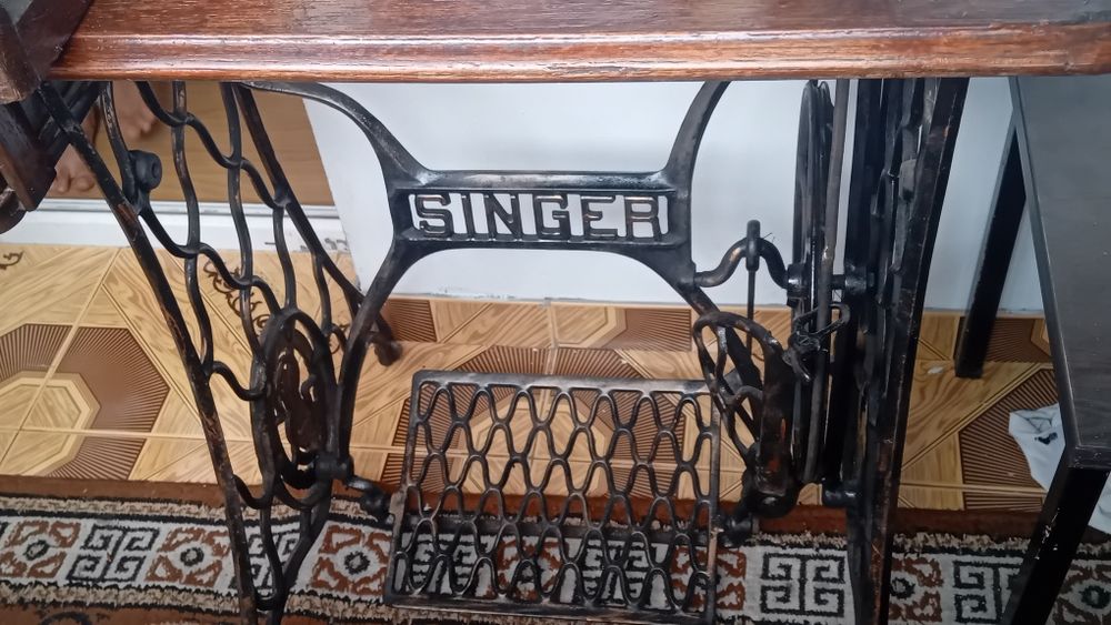 Mașină de cusut singer