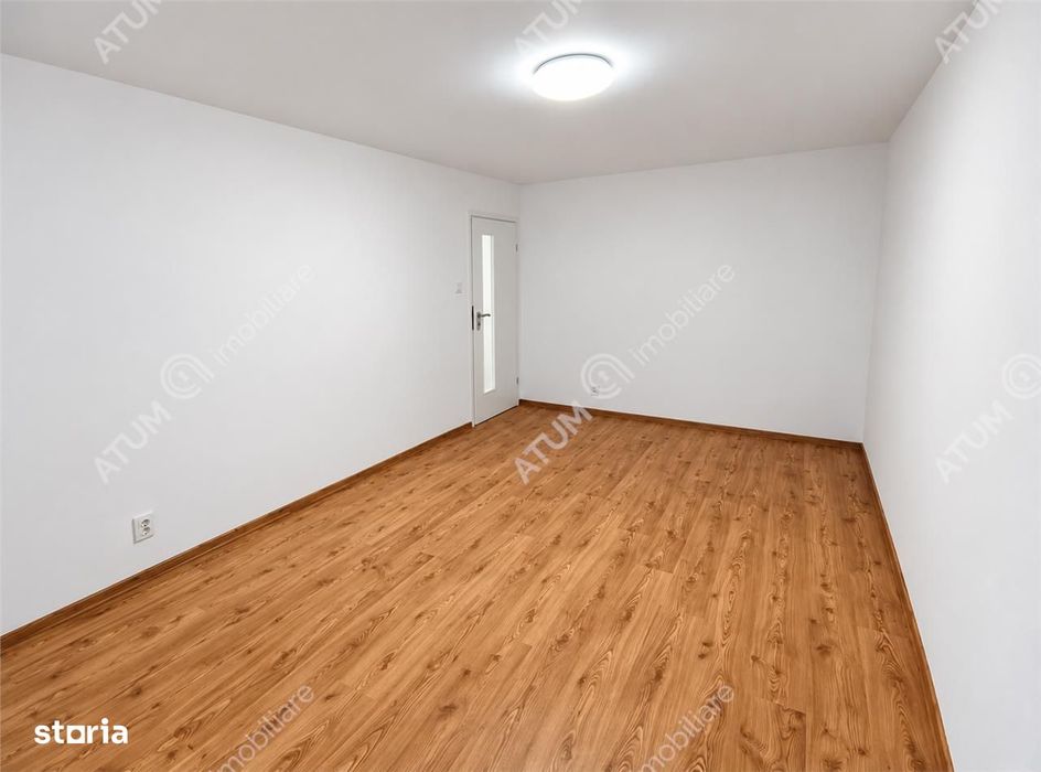 Apartament renovat cu 3 camere 2 bai si pivnita in Sibiu
