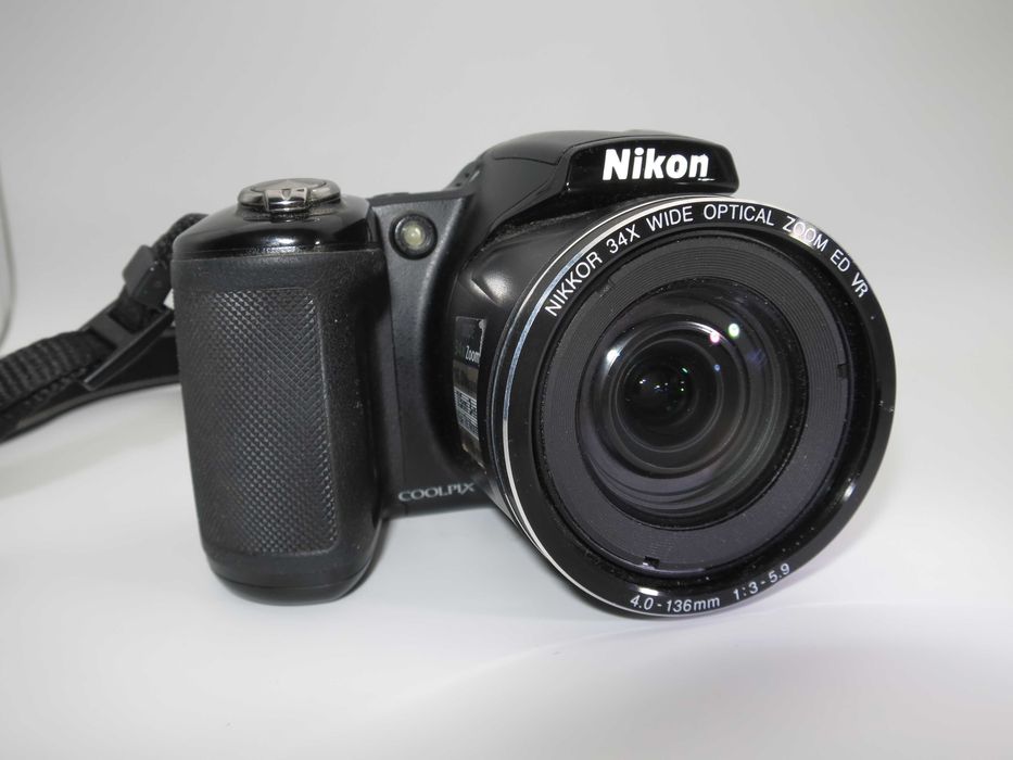Nikon Coolpix L830 компактен цифров фотоапарат с огромен 34х оптичен зуум, дигитална камера Full-HD видео клип, и флип екран, като НОВА, рабои отлично