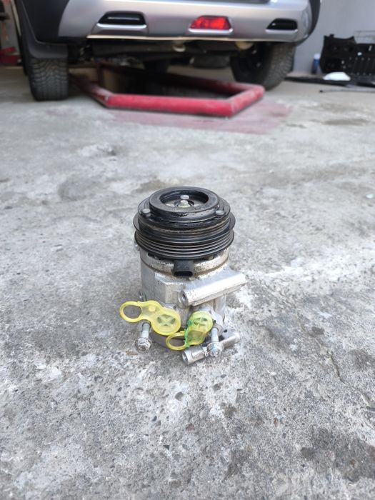 Компрессор авто кондиционера Спарк 1,25