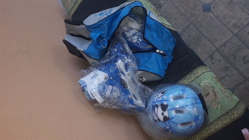 Роликовые коньки