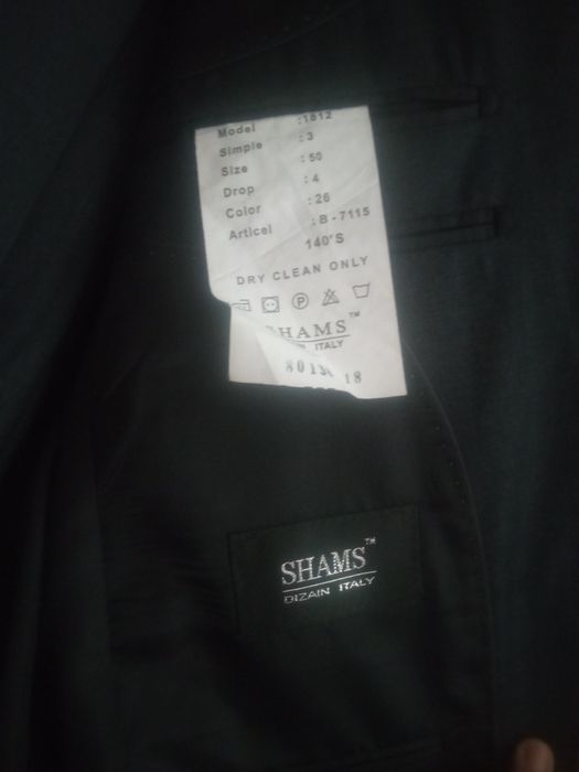 2ta kastyum shim,rangi toq seri va tomniy siniy,holati yengi