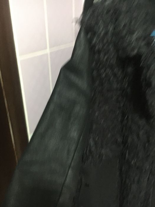 Черное пальто фирмы Сократ