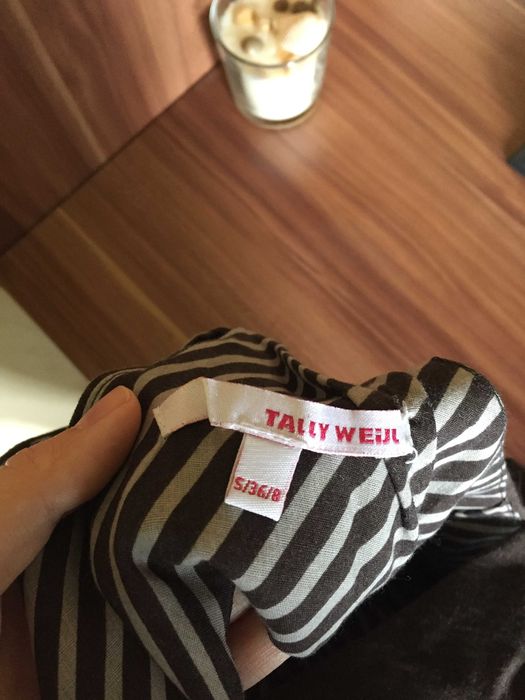 vesta cu decupaj la spate