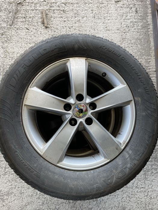 Set jante aliaj R16 5x105 Opel cu anvelope de iarna 215 65 R16