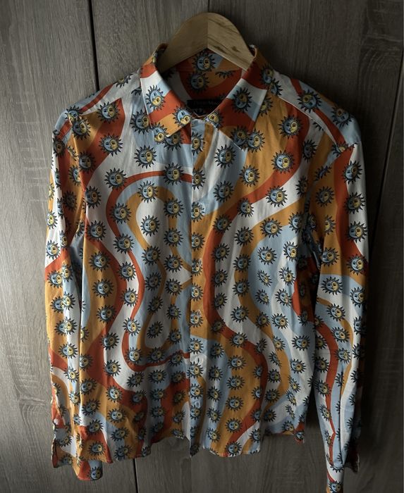 Риза Burberry, Desizo Monni