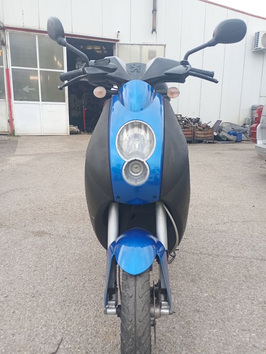 Peugeot скутер ..